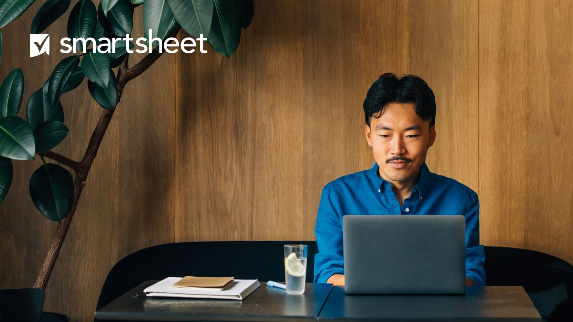 Man sitting in front of laptop