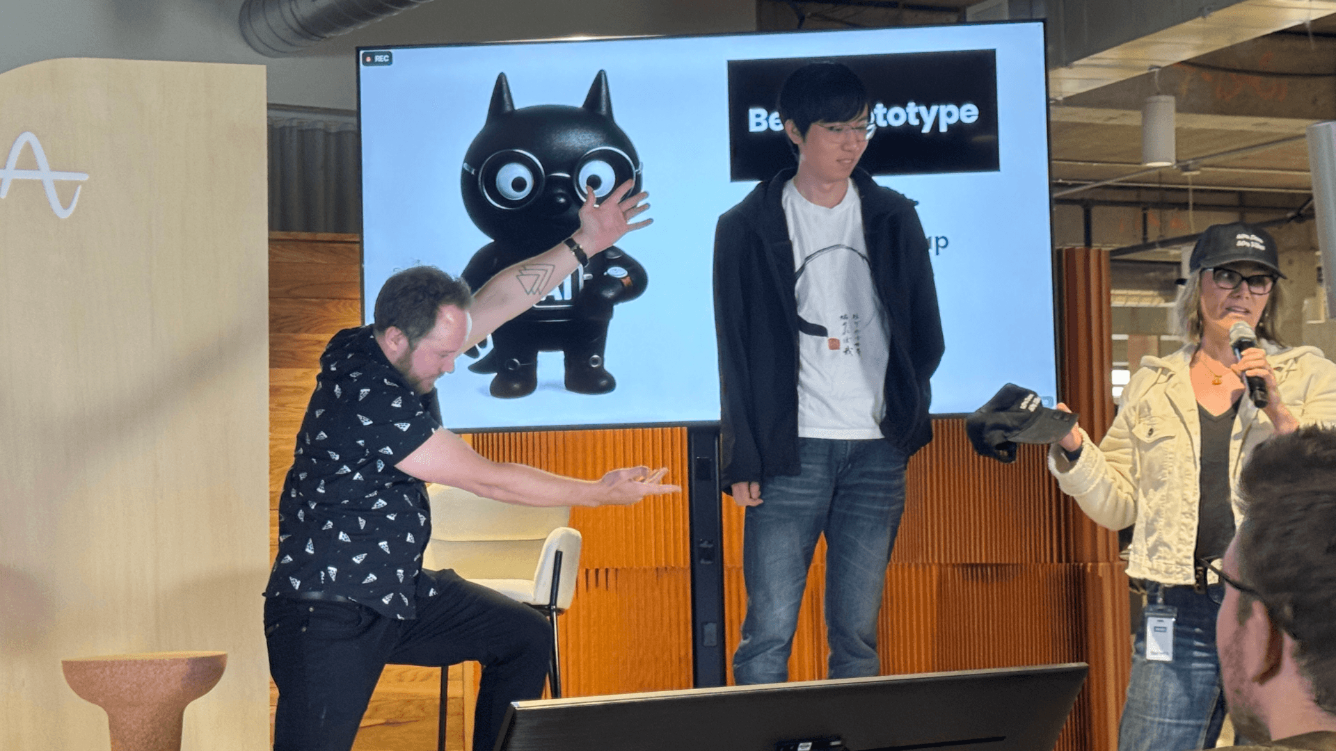 Amplitude team members receive the "Best Prototype" award at the end of AI Week