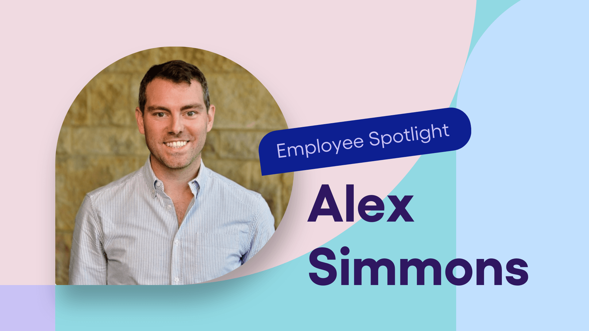 Alex Simmons smiles in front of an ochre background