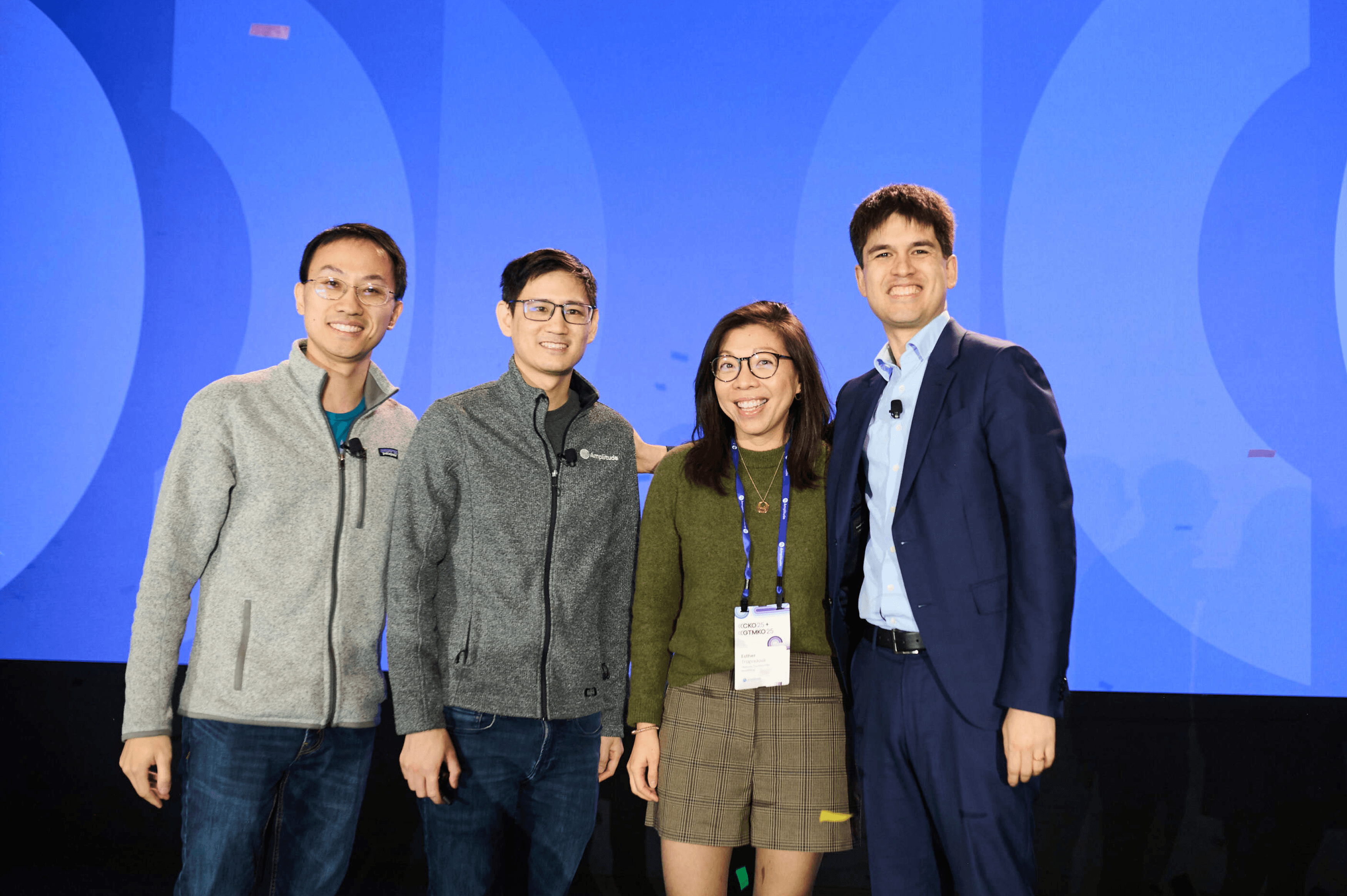 Esther stands with Amplitude co-founders Jeffrey Wang, Curtis Liu, and Spenser Skates