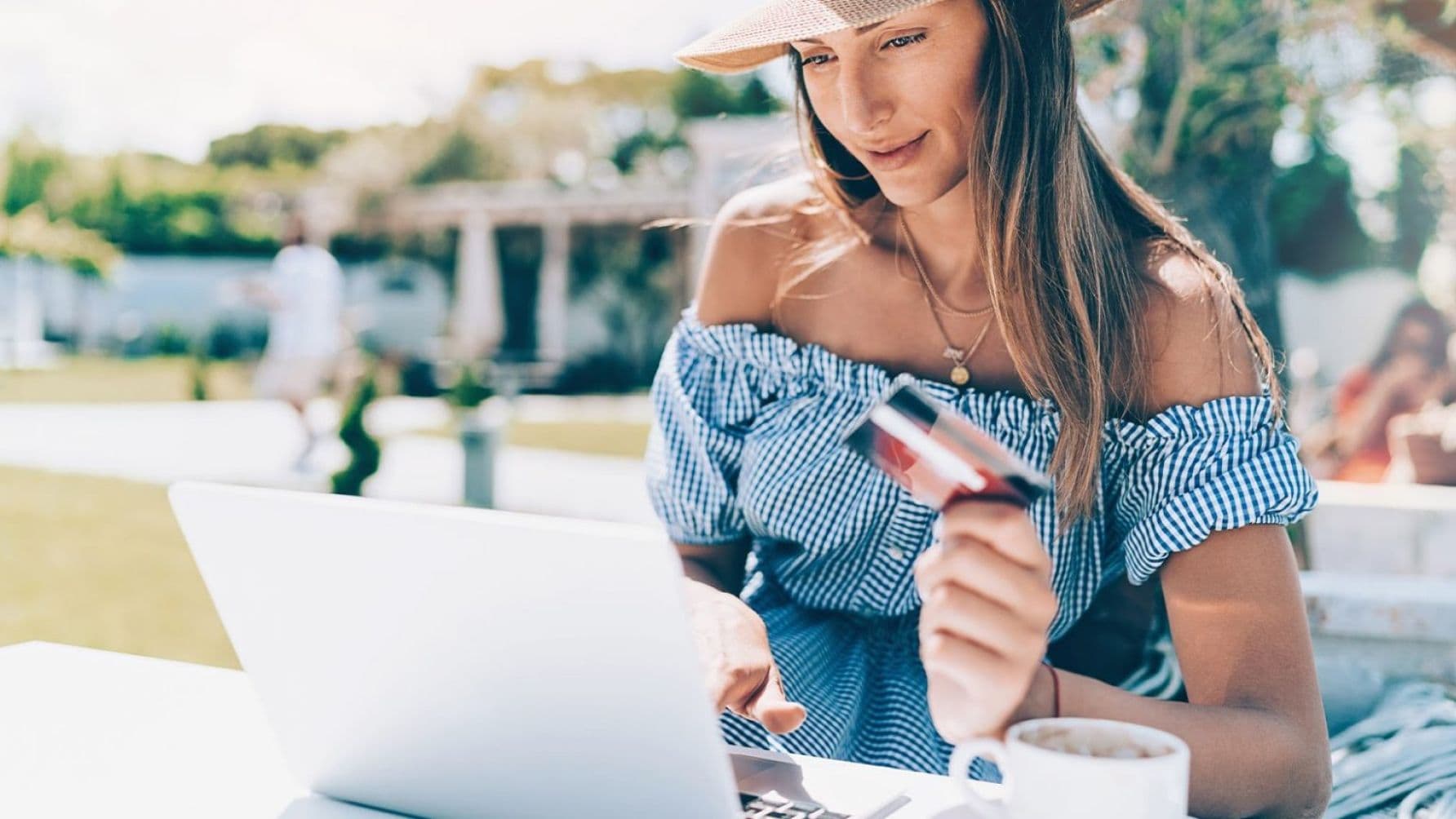 A lady on the laptop looks happy