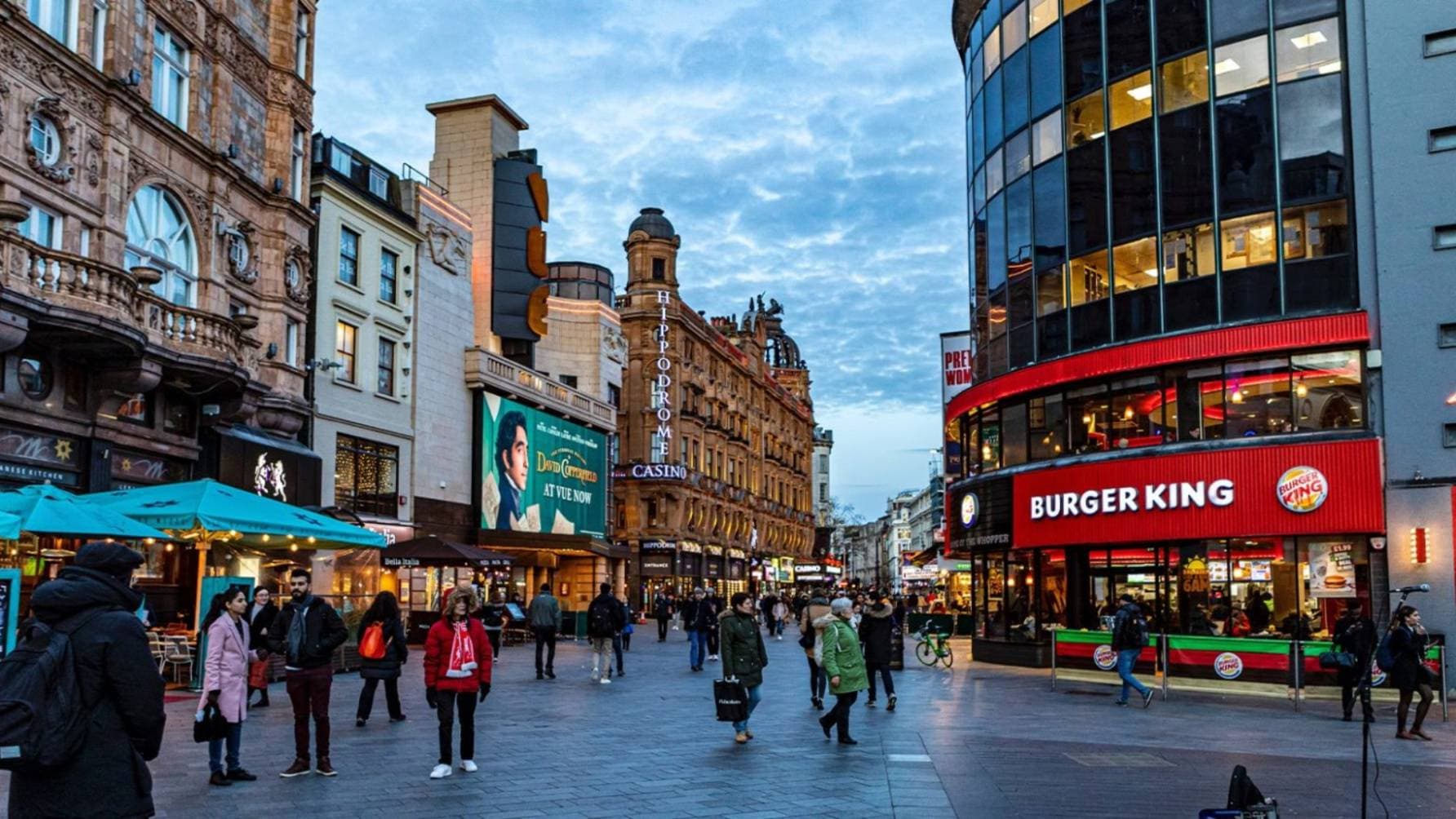 Crowds swarm the nearby streets of Burger King in Leicester Square, London