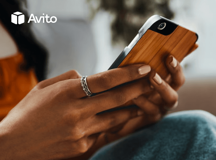 A close up of hands holding a phone