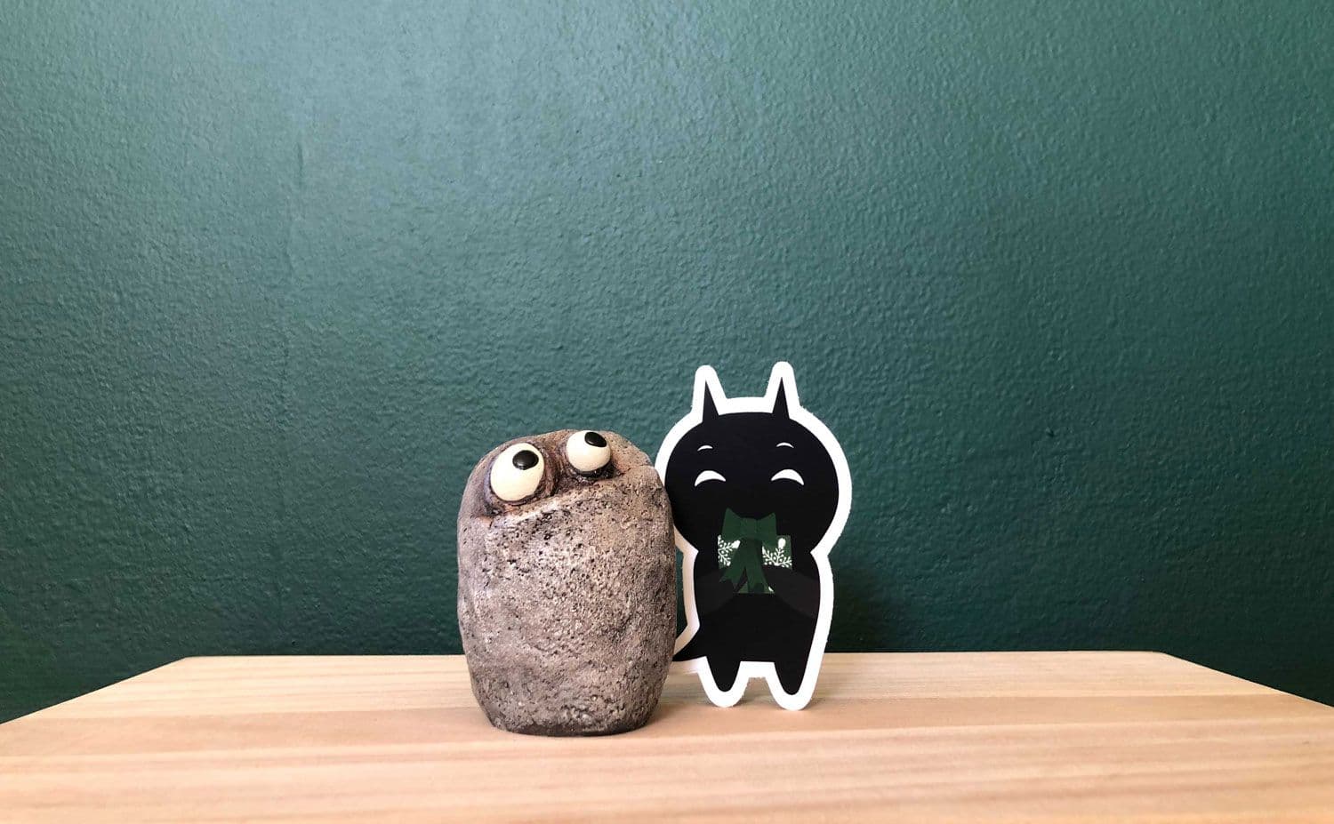 Amplitude's mascot, the Data Monster, with Tom the planter