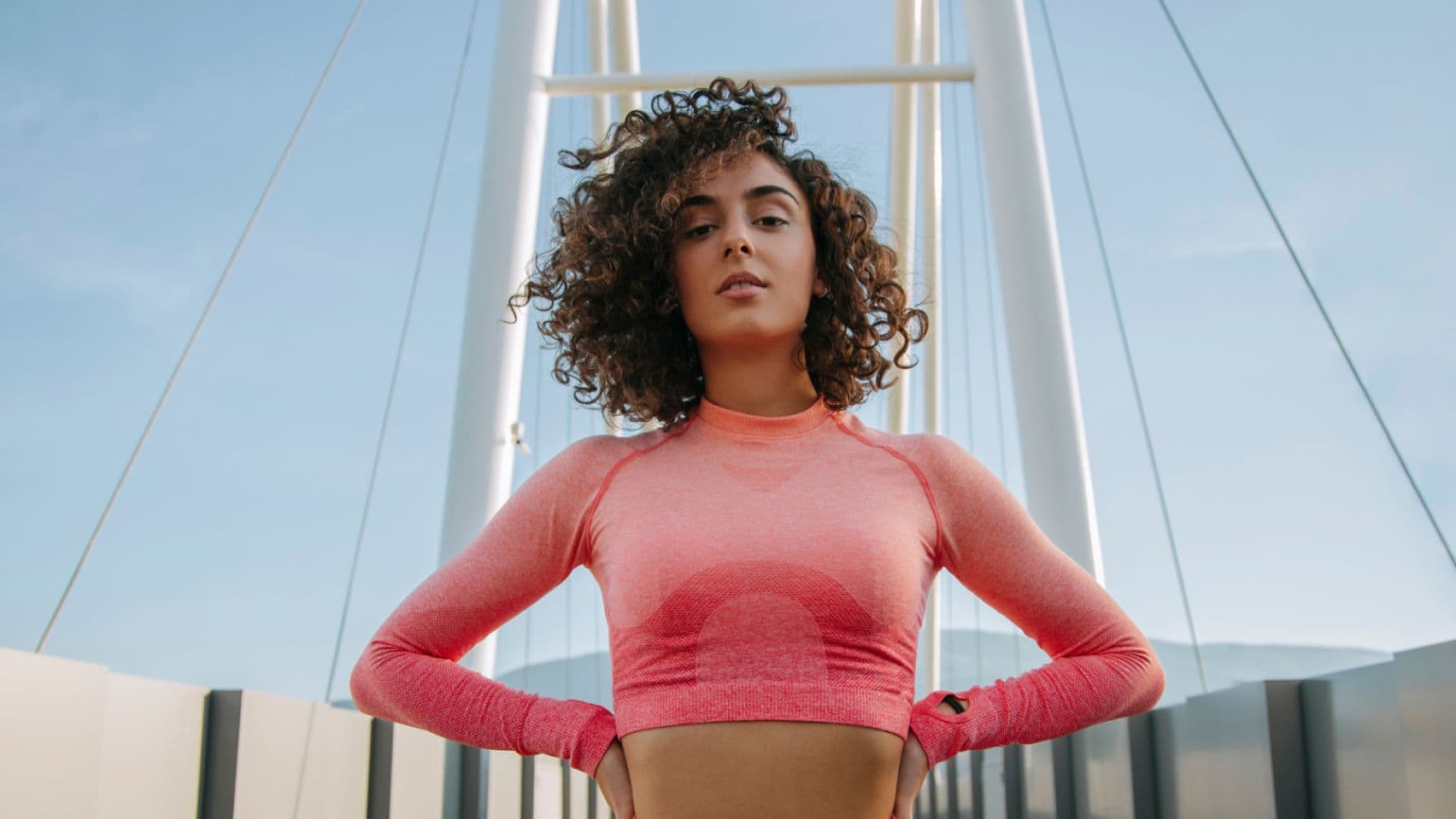 girl standing with her hands on the waist