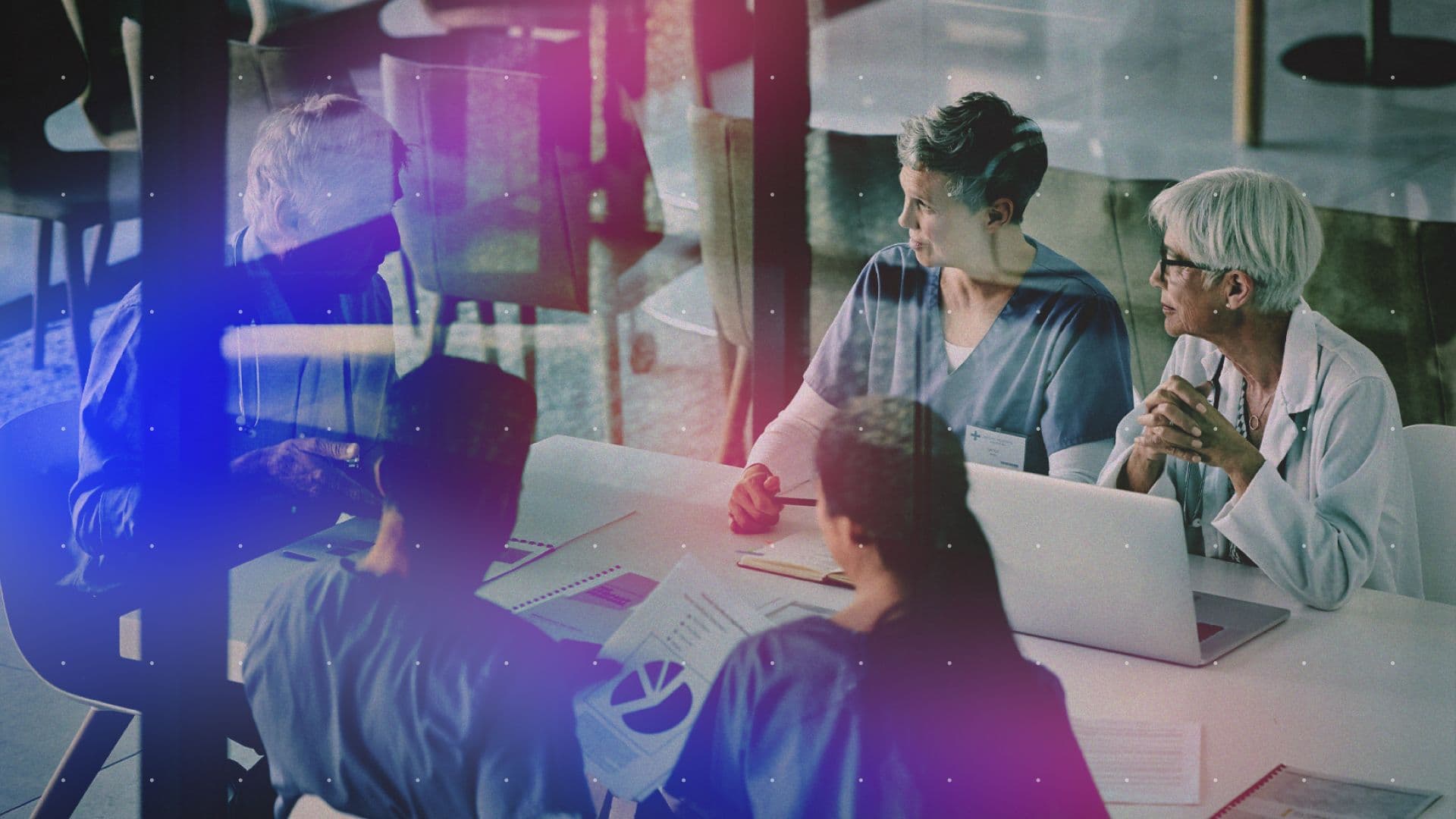 Healthcare professionals in a modern-looking meeting
